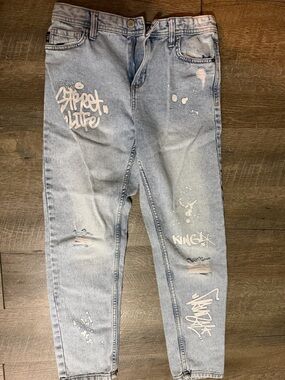 Light Blue Distressed Graffiti Women’s Jeans